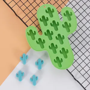 Detailed view of green cactus-shaped silicone ice cube mold with blue molded ice