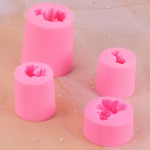 Detail showing varied sizes of pink silicone coral rock molds for DIY baking decoration