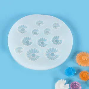 Detailed macro view of multi-size daisy flower silicone mold for fondant cake decoration