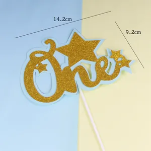 Detail of gold glitter One cake topper with stars for 1st birthday party decoration