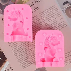 Top view of two pink silicone unicorn molds for fondant chocolate and resin art decorations