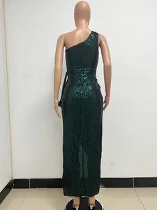 Elegant emerald green one-shoulder sequin maxi dress featuring back detail on a mannequin