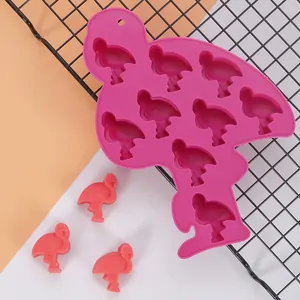 Detail view of pink flamingo silicone mold and finished bird-shaped candies