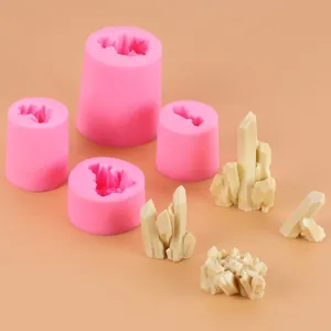 Detail view of pink silicone molds with white crystal-shaped resin or wax clusters