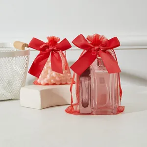 Élégant sac cadeau en organza rouge avec cordon de serrage en satin pour bijoux