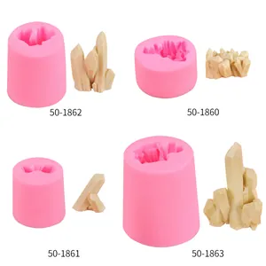 Detailed view of pink silicone molds for creating rock and crystal cake decorations