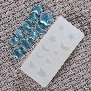Detailed macro view of star and moon shaped silicone mold for DIY crystal resin jewelry