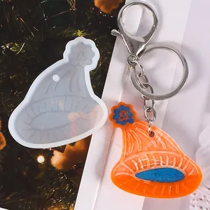 DIY silicone resin mold for beanie hat keychain and finished orange pendant display