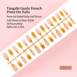 Gedetailleerd overzicht van 30 stuks geel verloop French tip kunstnagels voor salons