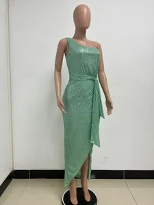 Elegant mint green sequined one-shoulder evening dress displayed on a professional mannequin