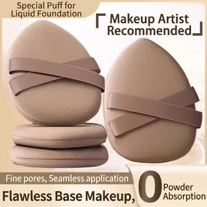 Detailed view of the double-sided ribbon design and fine pores on the soft powder puffs.