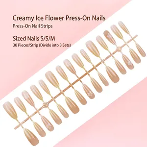 Professionele set van 30 crème nude plaknagels met ijsbloempatronen in de maten S/S/M