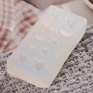 Detailed macro view of 10-hole star and moon silicone mold for DIY resin jewelry crafts