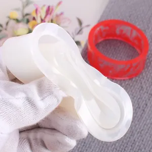 Detailed close-up of a flexible silicone mold for DIY C-shaped resin jewelry bracelets
