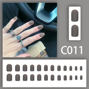 Detailed view of 24pcs matte coffee brown short round press-on nail set, model C011