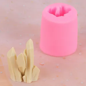 Close-up detail view of pink silicone mold with a finished crystal column resin decoration