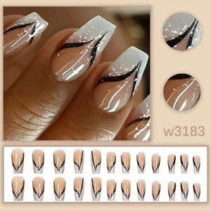 Detailed view of nude press-on nails featuring black V-lines and silver glitter