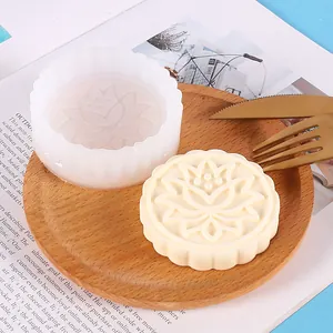 Detailed lotus flower pattern on a round silicone mold for handmade soap and candles