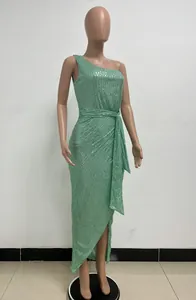 Detail of mint green one-shoulder sequined long dress with elegant waist tie drape