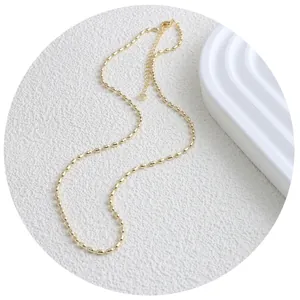 Minimale goldene Metall Reiskettenhalskette mit elegantem Retro Schlüsselbein Design
