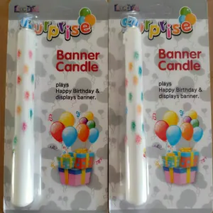 Detailed view of two surprise banner candles in retail packaging for birthday parties
