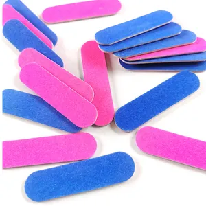 High-definition close-up of colorful mini double-sided wooden nail files for manicure
