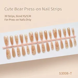 Vue détaillée de bande d'ongles nus avec motifs d'ours mignons et texte de chance