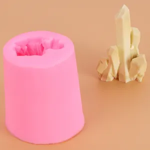 Detailed close-up of pink silicone mold with crystal iceberg shape for cake decoration
