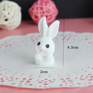 Detailed view of a cute white rabbit miniature figurine with 4.5cm height dimension markings