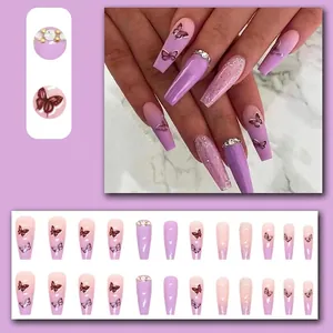 Elegant purple gradient press-on nails with butterfly embossing and rhinestones.
