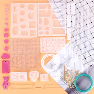 Comprehensive 229-piece DIY jewelry resin mold kit including silicone molds and tools