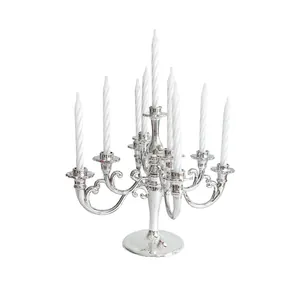 Vintage silver 9-arm plastic candelabra with white spiral candles for cake decoration