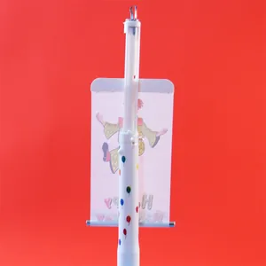 Creative surprise party cake candle featuring a pull-out funny clown birthday banner