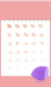 Detailed view of a purple makeup sponge with foundation release test swatches