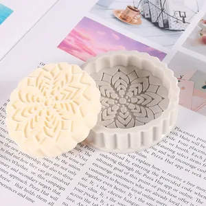 Close-up of mandala patterned mooncake silicone mold and finished plaster product