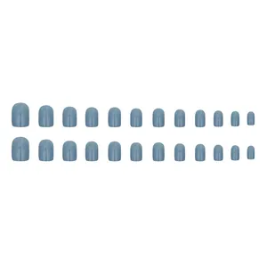 Set of 24 short dusty blue solid color glossy press-on nails on white background