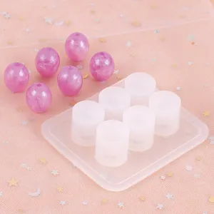 6-cavity cilindrische siliconen mal voor DIY hars sieraden kralen met paarse monsters
