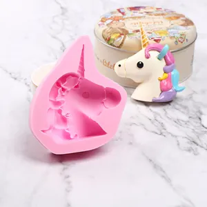 Detailed macro view of a pink unicorn-shaped silicone mold for fondant and resin