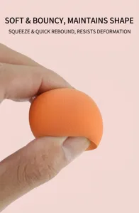 Close-up showing the soft texture and high elasticity of an orange makeup sponge blender