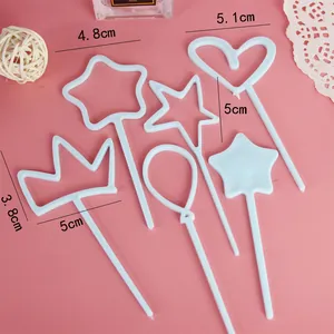 Detailed dimensions of white plastic cake toppers in heart, star, and crown shapes