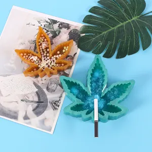 Handmade leaf shaped resin ashtray mold in sparkling teal and amber tones for DIY crafts