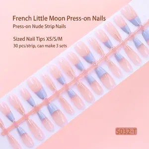 Detailed view of nude and lavender French moon style press-on nail tips strip S032-T