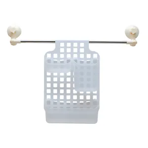 Detailed view of white plastic hanging organizer with suction cup rod for kitchen or bathroom use