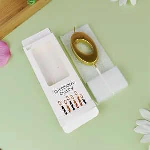 Gold number 0 birthday candle in white packaging for creative cake party decoration