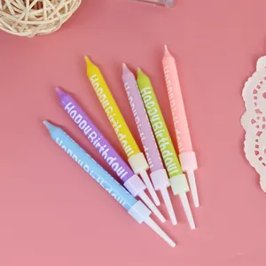 Macro detail of colorful Happy Birthday letter candles for cake decoration baking