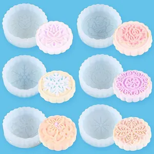 Set of diverse mooncake-shaped silicone molds for DIY scented candle and soap craft making