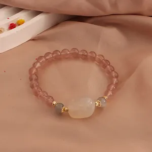 Natural strawberry quartz beaded bracelet with moonstone and carved cat paw pendant