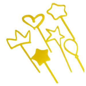 Yellow plastic cake toppers set featuring heart star crown and balloon shapes for party