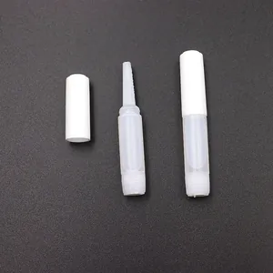 Set of mini transparent plastic nail glue applicator tubes with secure white caps