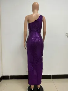 Back view of a elegant purple one-shoulder sequined evening long dress displayed on a mannequin.